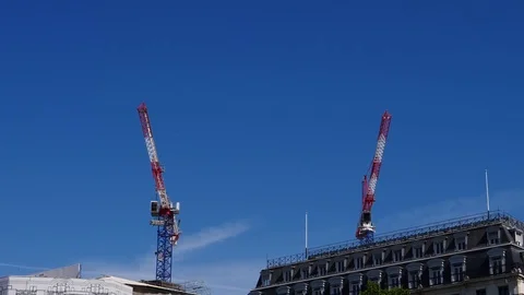 Tower cranes, Paris on a blue sky Stock Footage 77402864