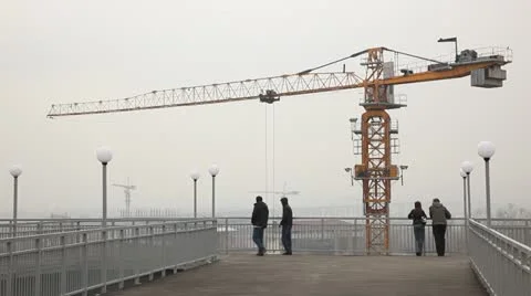 Tower cranes &amp; people Stock Footage 12567213