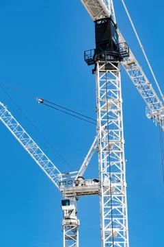 Tower cranes in the sky Stock Photos