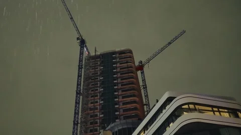 Tower Cranes on Skyscraper Under Construction Stock Footage 345901426