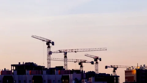 Tower cranes at sunset Stock-Footage 79988200
