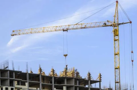 Tower cranes Tower cranes on the construction of a residential building on... Fotos de archivo