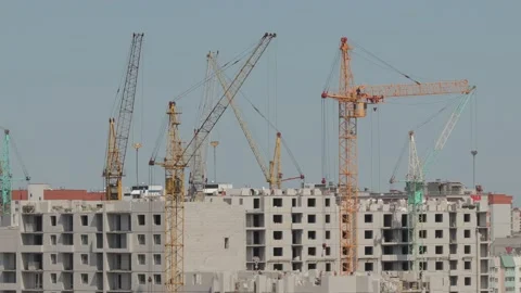 Tower cranes work on the construction of a high-rise building, time-lapse video. Stock-Footage 133622727