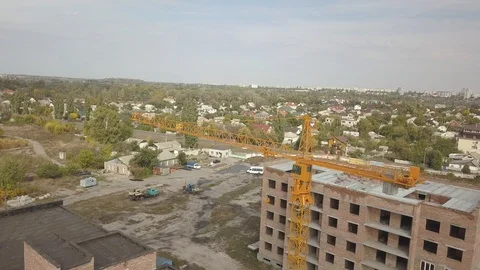 Tower cranes work during the construction of a multi-story building. Stock Footage 123548282