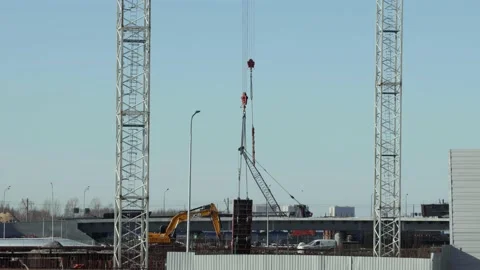 Tower cranes working on a construction site, steel reinforcement Stock Footage 171639831