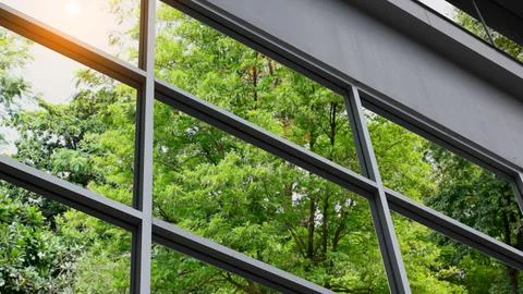 The tower design using big window laminated glass exterior with reflecting .. Fotos de archivo