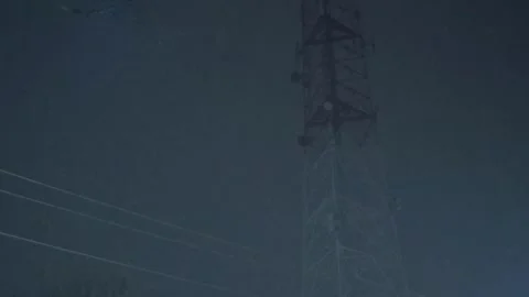 Tower During Night Snowstorm Video stock 168999799