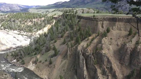 Tower Falls of the Yellowstone River in Grand Canyon of Yellowstone Stock Footage