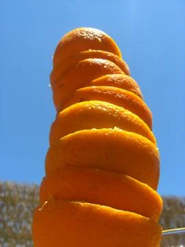 Tower of freshly squeezed oranges Stock Photos