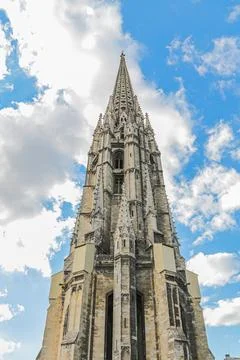The tower of a Gothic patterned church in Bordeaux France Stock Photos