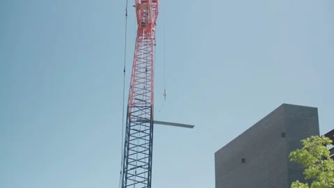 A tower that has a sign on the side of a building Stock Footage 155540778
