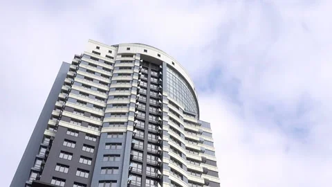 Tower high-rise building in the cloudy sky. Stock Footage 130876044