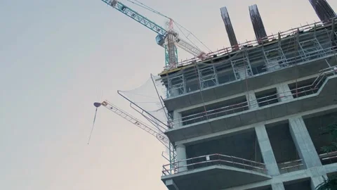 Tower lifting crane and high residential apartment building Stock Footage 226136888