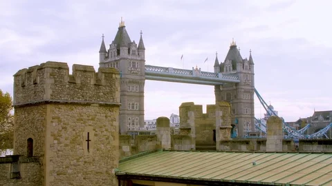 Tower of London stone tower with Tower Bridge in the background Stock Footage 82802801