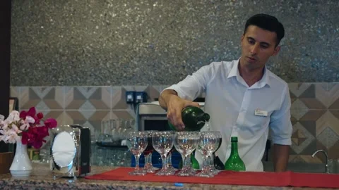 Tower made of glasses with champagne on table. View of delicious alcohol free Video stock 279057133