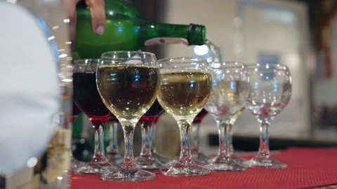 Tower made of glasses with champagne on table. View of delicious alcohol free Video stock 279057266