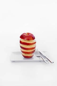 Tower made of horizontal red apple slices Stock Photos