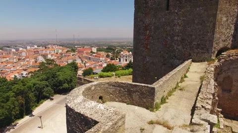 Tower of Medieval Castelo de Palmela on the background of the city aerial view Stock Footage 64772472