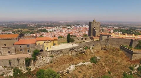 Tower of Medieval Castelo de Palmela on the background of the city aerial view Stock Footage 64772474