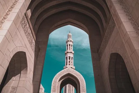 A tower of the mosque between a portal. Stock Photos