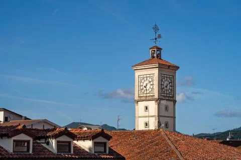 Tower of the old town hall with a clock in Guernica, Basque Country, Spain. Over Stock Photos