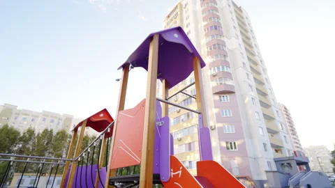 Tower with slide and ropes at children maze on playground Видео 331344591