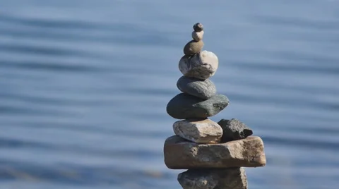 Tower of stone on the shores of lake Stock Footage 65364984