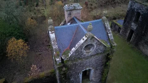 Tower Summit View: Aerial Drone Ascent to Central Tower Roof - 4K Stock Footage 256044654