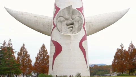 Tower of the Sun Statue by Okamoto Taro, built for Expo 70', in Osaka - Pan Stock Footage 134752995