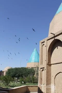 Tower with turquoise dome under clear blue sky, showcasing stock photo. Stock Photos
