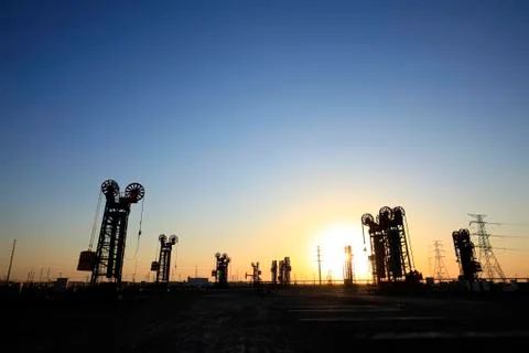 The tower type pumping unit in the evening Stock Photos