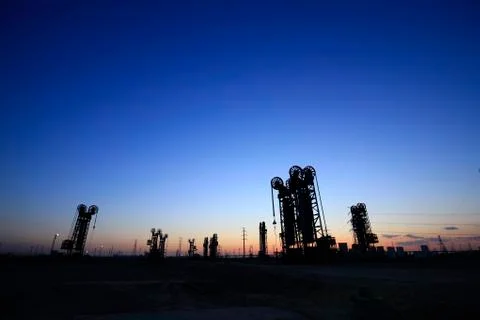 The tower type pumping unit in the evening Stock Photos