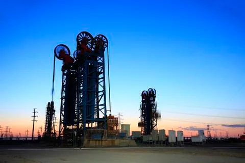 The tower type pumping unit in the evening Stock Photos