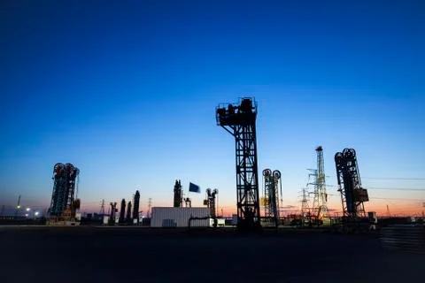 The tower type pumping unit in the evening Stock Photos