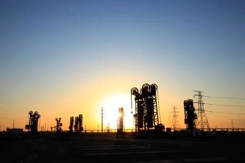 The tower type pumping unit in the evening Stock Photos