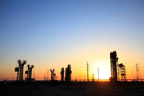 The tower type pumping unit in the evening Stock Photos