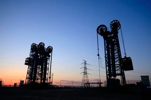 The tower type pumping unit in the evening Stock Photos