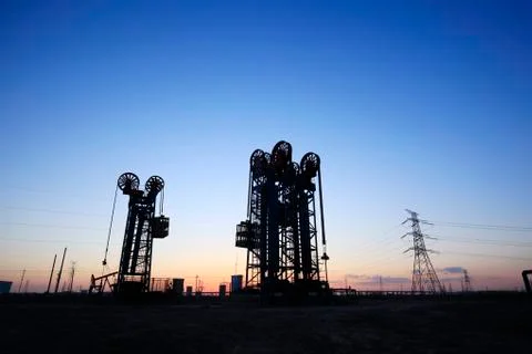 The tower type pumping unit in the evening Stock Photos