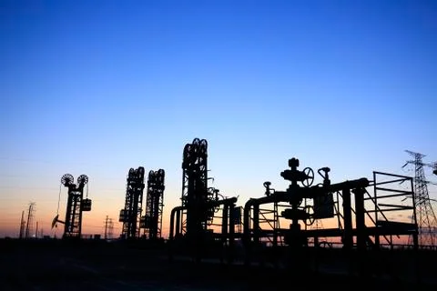 The tower type pumping unit in the evening Stock Photos