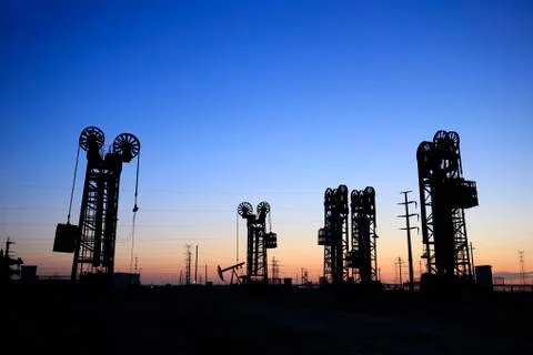 The tower type pumping unit in the evening Stock Photos