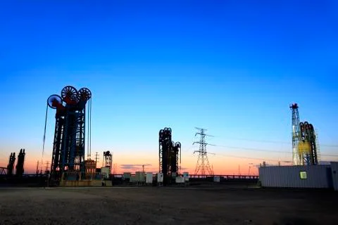 The tower type pumping unit in the evening Stock Photos