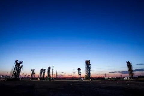 The tower type pumping unit in the evening Stock Photos