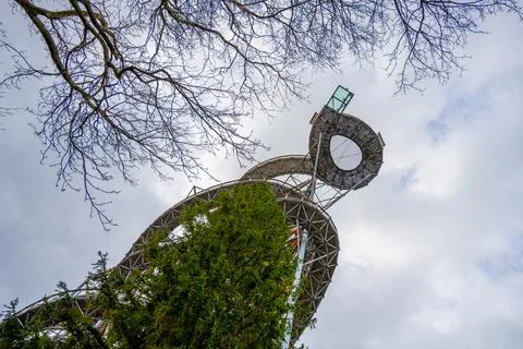 Tower View From Below Shows Structure and Clouds Stock Photos