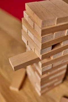 Tower of wood blocks stack game on the table Stock Photos