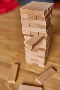 Tower of wood blocks stack game on the table Stock Photos