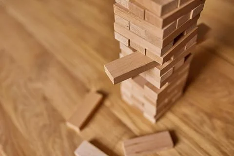 Tower of wood blocks stack game on the table Stock Photos