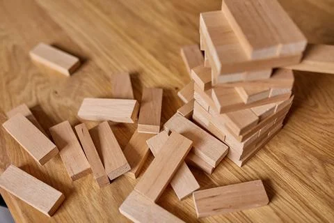 Tower of wood blocks stack game on the table Stock Photos