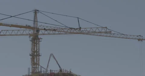 TowerCrane tilt up from mountain Video stock 53347081