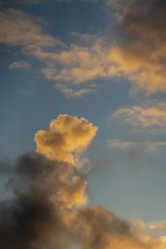 Towering cloud column with glowing edges Stock Photos
