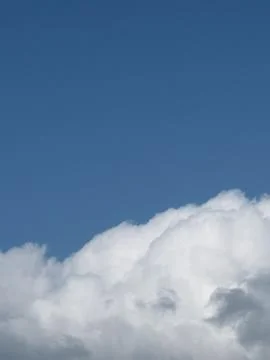 Towering Cumulus Cloud Edge Against Blue Sky Stock Photos
